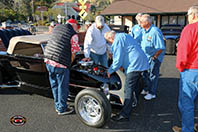 Make room for master mechanic Jerry Kugel, after Jeff Bates roadster had to be flat bedded